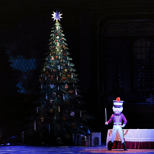 The Nutcracker grows during the Act I transformation scene. 