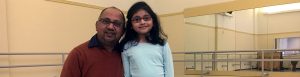 Aditi Kumar with her father at a Pittsburgh Ballet Theatre Adaptive Dance class.